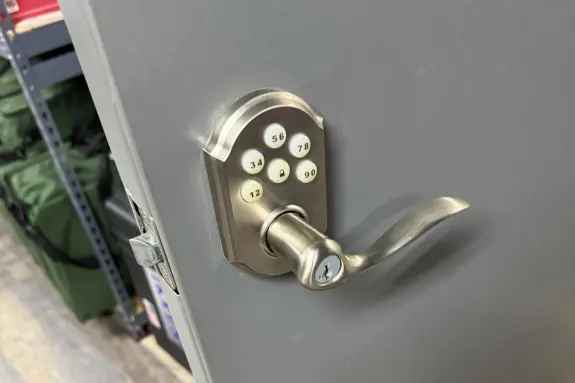 Professional commercial locksmith services in Frederick installing keyless entry keypad locks for business security.